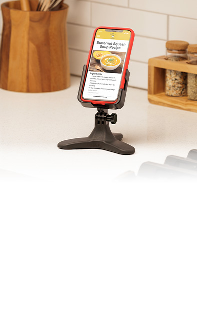 A DeskFone on the kitchen counter showing a soup recipe